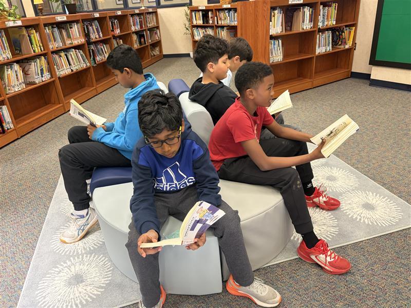 Reading in the library!