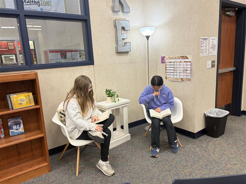 Reading in the library!