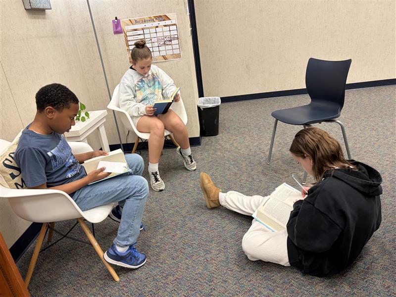 Reading in the library!