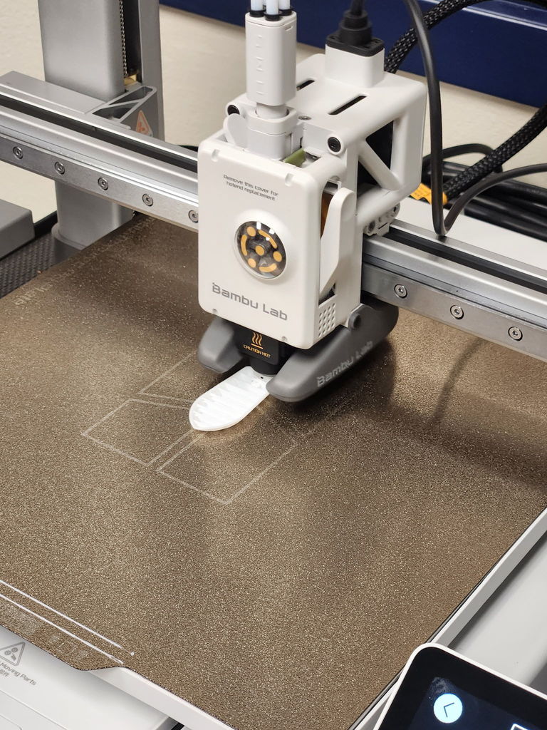 A 3D printer printing a boat.