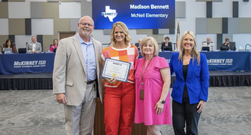 Superintendent Pratt, Madi Bennett, Tracy Meador and Shelly Spaulding standing together with an award
