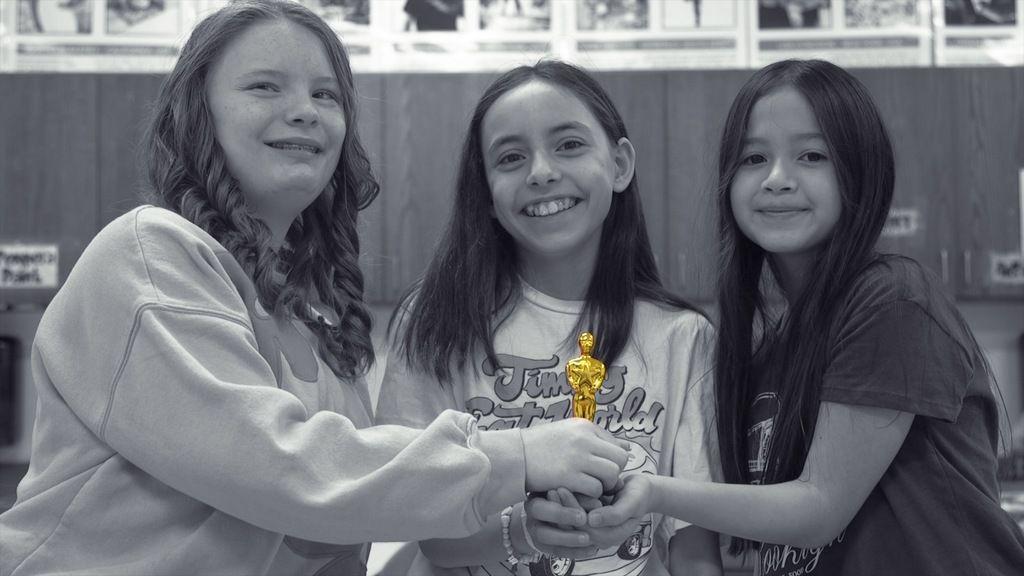 Three 5th-grade art students from Finch Elementary