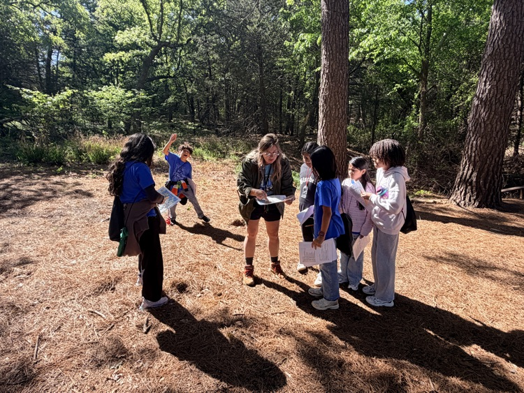 Camp Jolt, students using a map and compass 