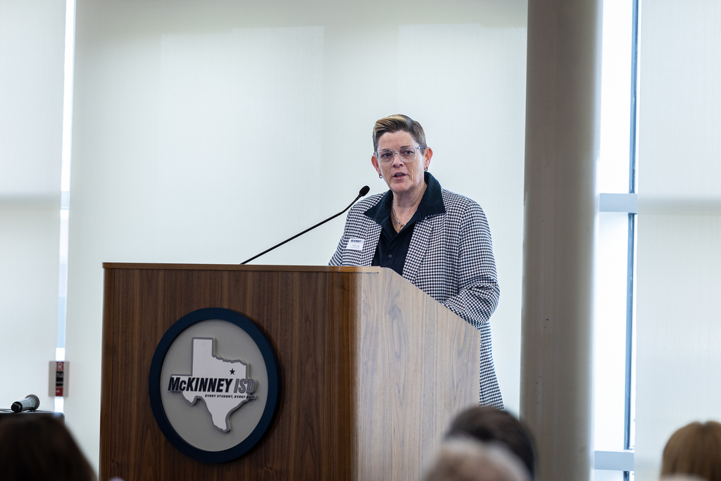 Allie Long at the podium