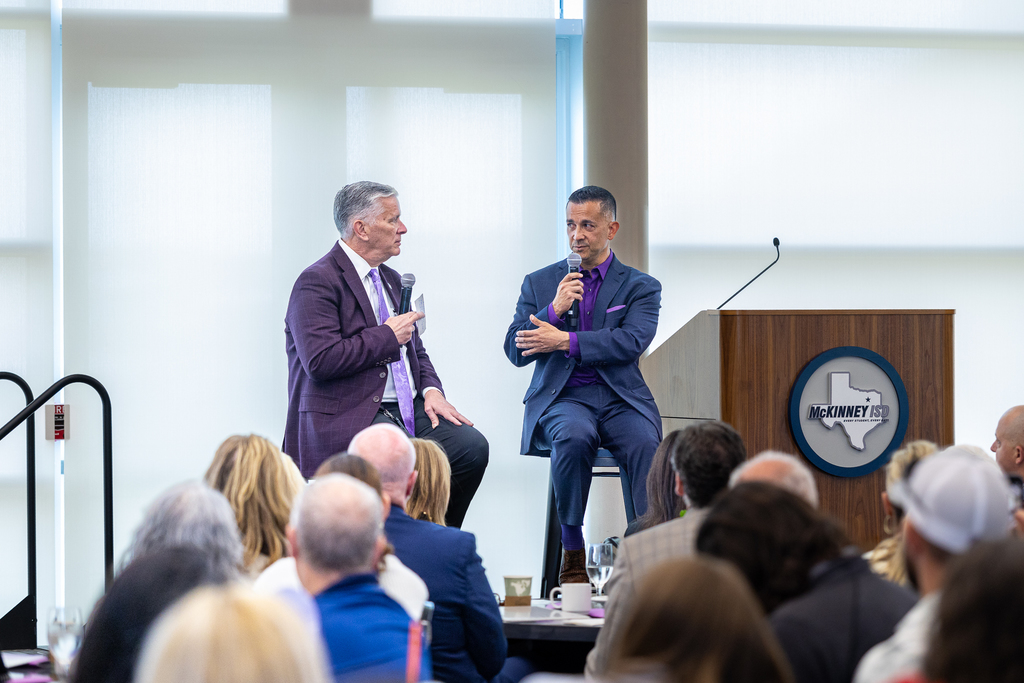 speakers Jason Hernandez and Patrick Cloutier on stage