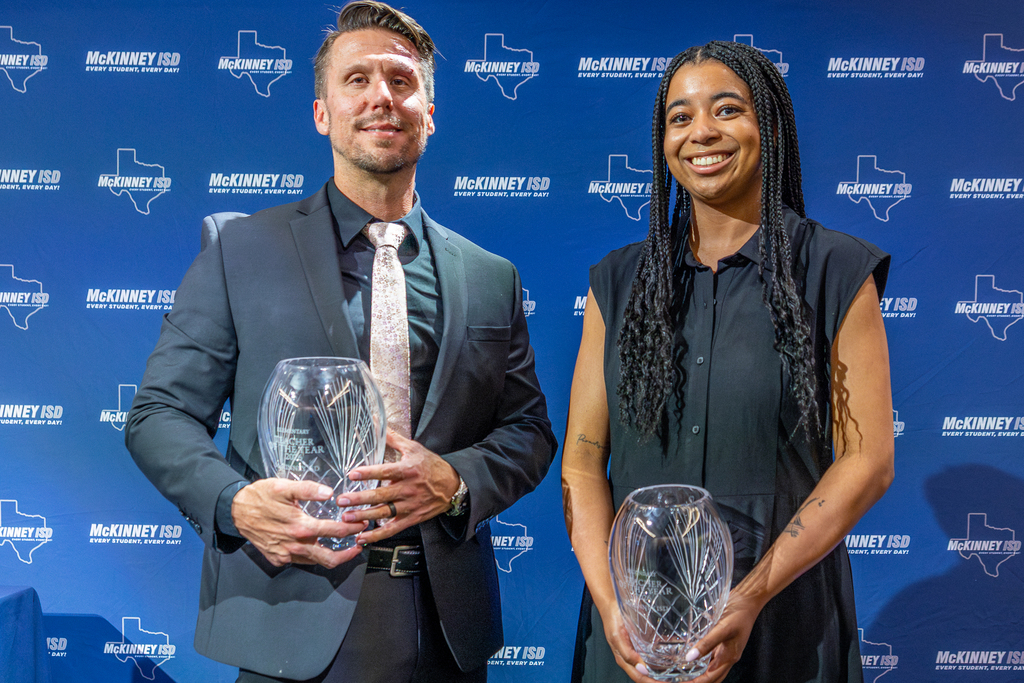 Tommy Gillett and Reagan Brannon on stage together holding their awards