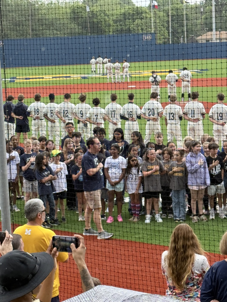 finch choir singing at baseball game
