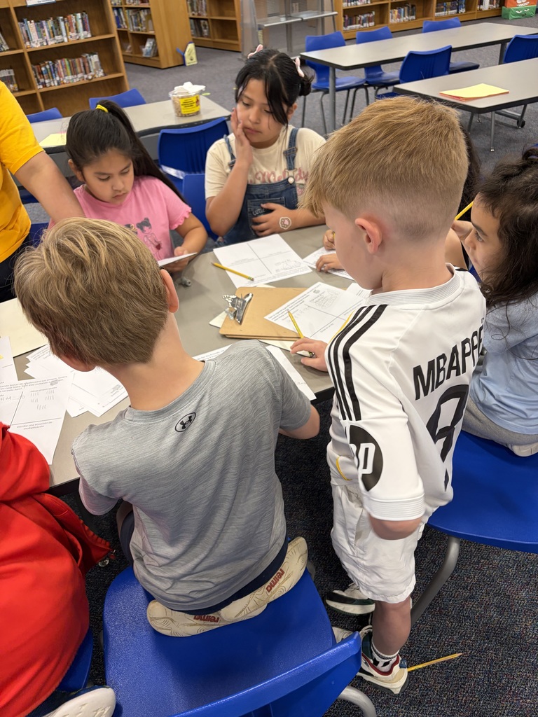 2nd graders finding text features.