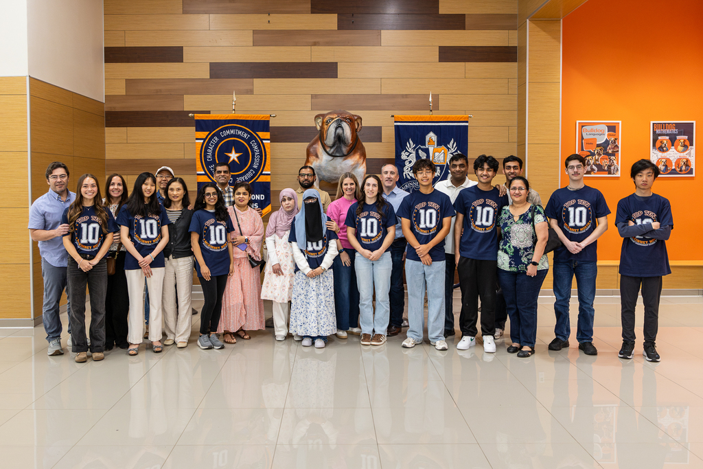 Group photo of Top 10 with parents
