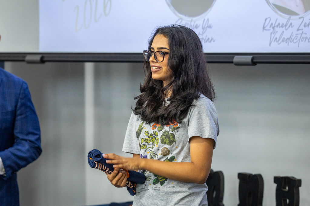 #3 Shreya Chougule speaking in front of group