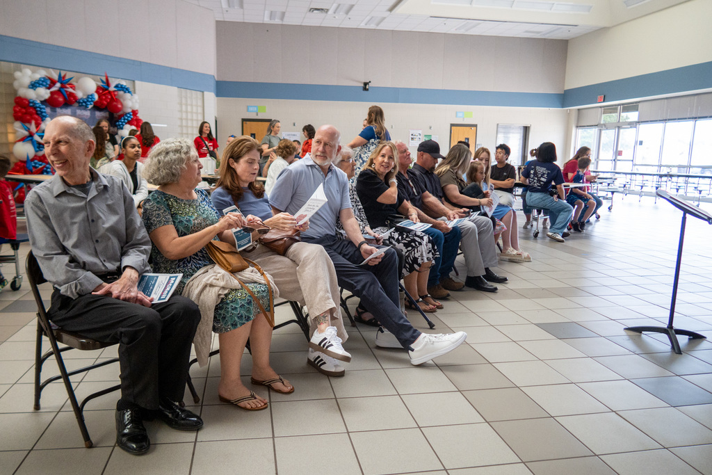 members of the mcneil family attend the mcneil legacy celebration ceremony
