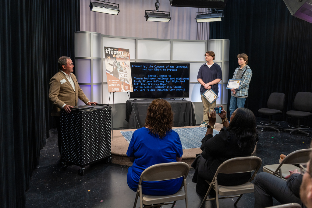 Bill Cox Speaking at podium