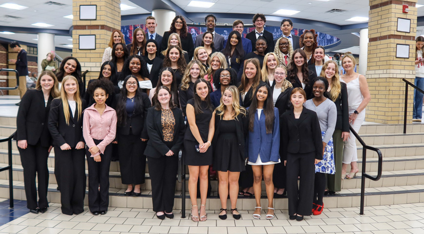 ISM students pose for a photo during ISM final presentation night 