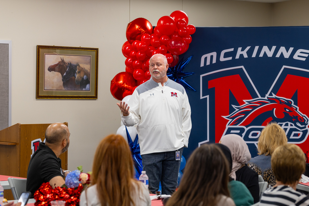 Pratt speaking to the group