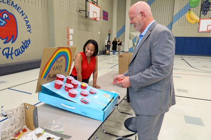 superintendent shawn pratt plays a game at malvern steam night