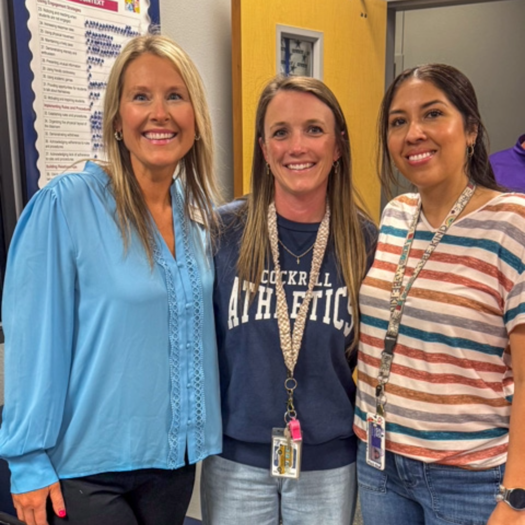 assistant superintendent of  PR and communications dr. shelly spaulding takes a photo with cockrill teachers 
