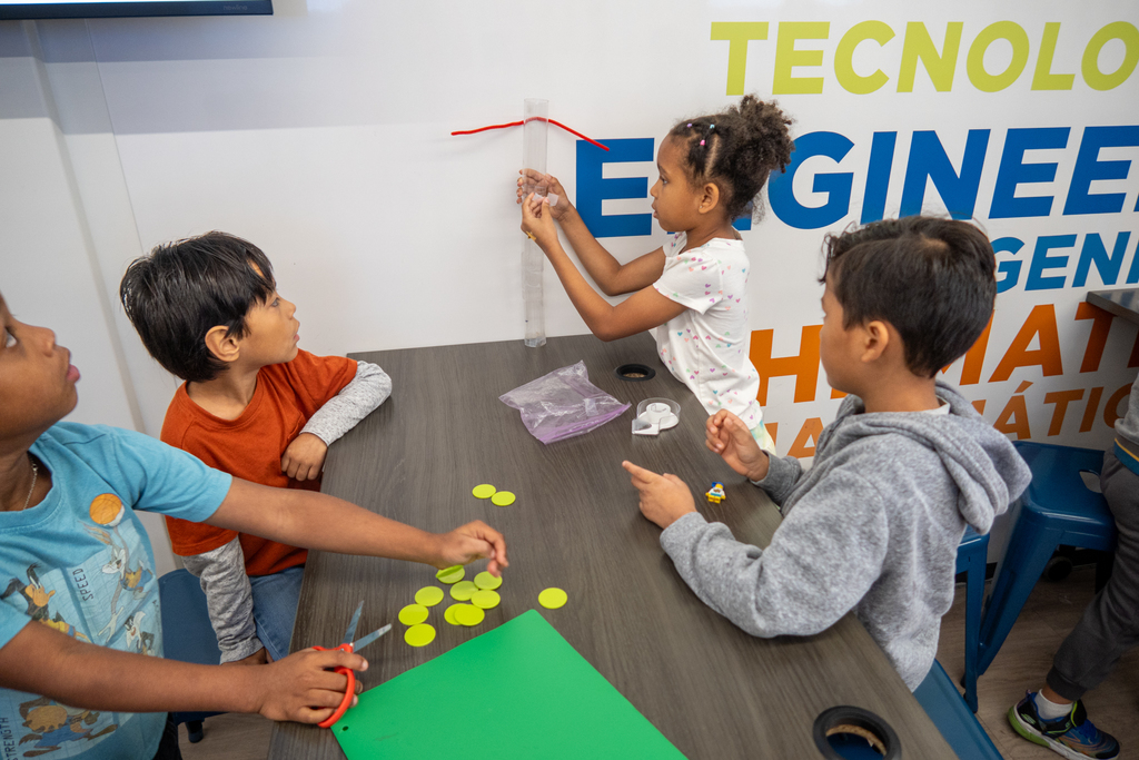students at caldwell build a tower in the mobile stem lab
