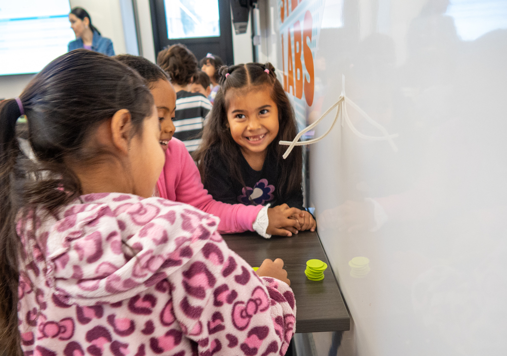 students at caldwell build a tower in the mobile stem lab