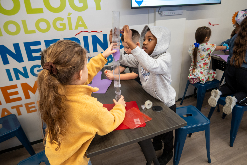 students at caldwell build a tower in the mobile stem lab
