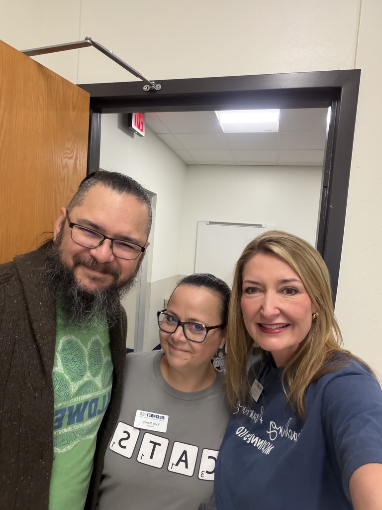 dr. amber epperson takes a photo with a teacher at caldwell dual language academy 