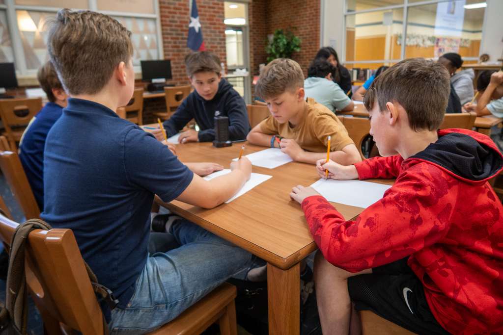 students participate in a lesson about personal financial literacy