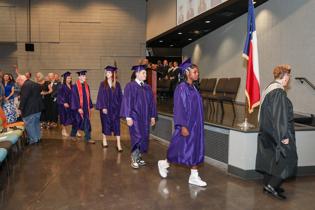 graduates processing into graduation