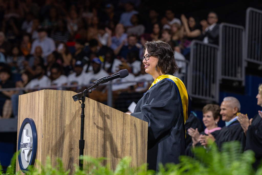 principal paula kent at the podium