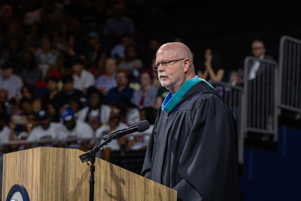 superintendent shawn pratt at the podium