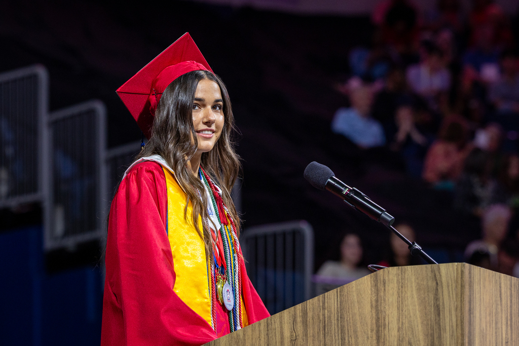 female graduate at the podium