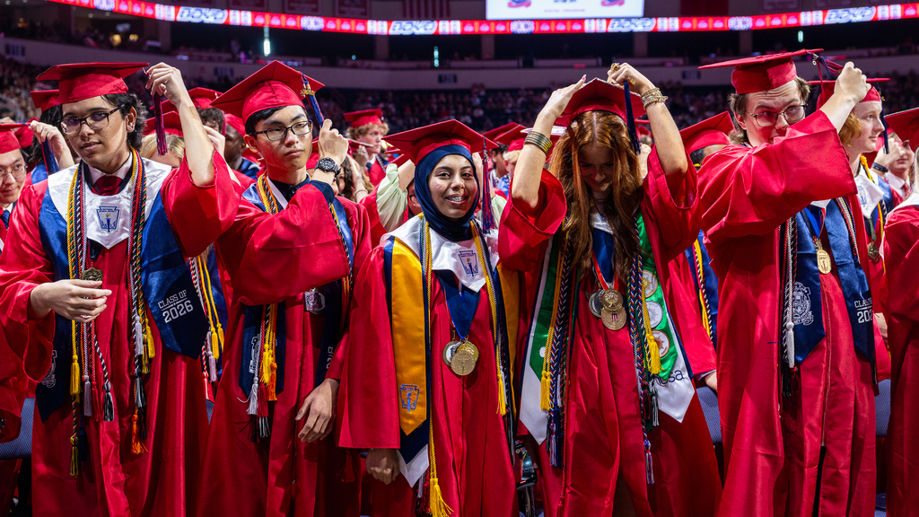 graduates turning their tassels