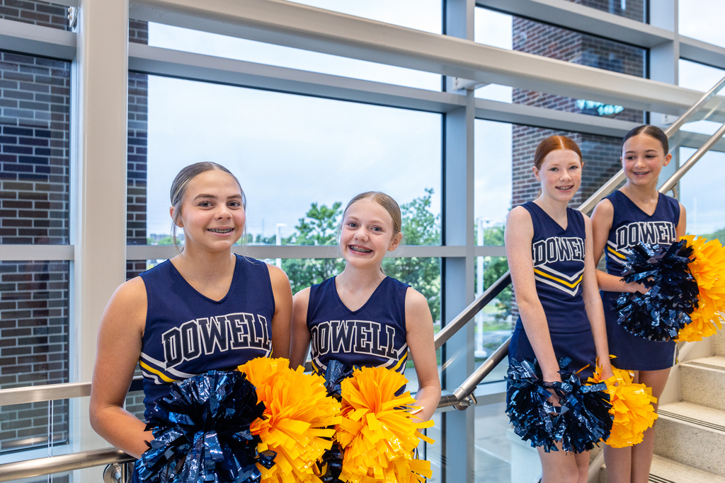 Dowell cheerleaders smiling