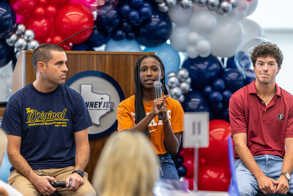 female student speaking during panel