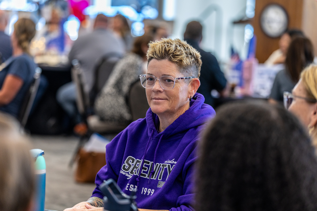 serenity principal at table listening