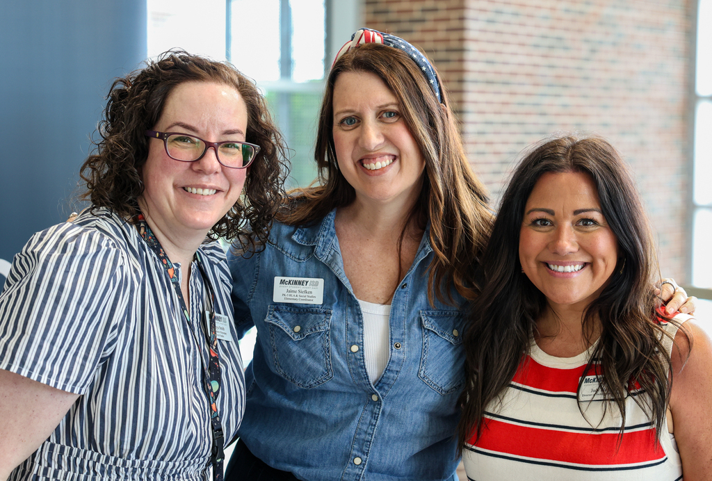 three instructional coordinators smiling for camera