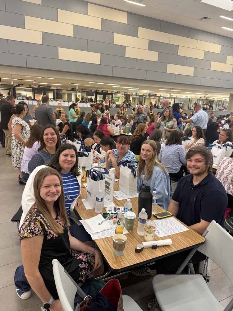 new teachers sitting at a table