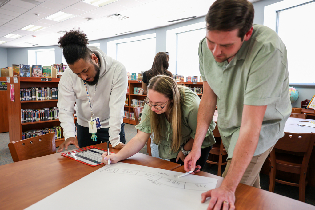 teachers attend new hire training at mcclure elementary