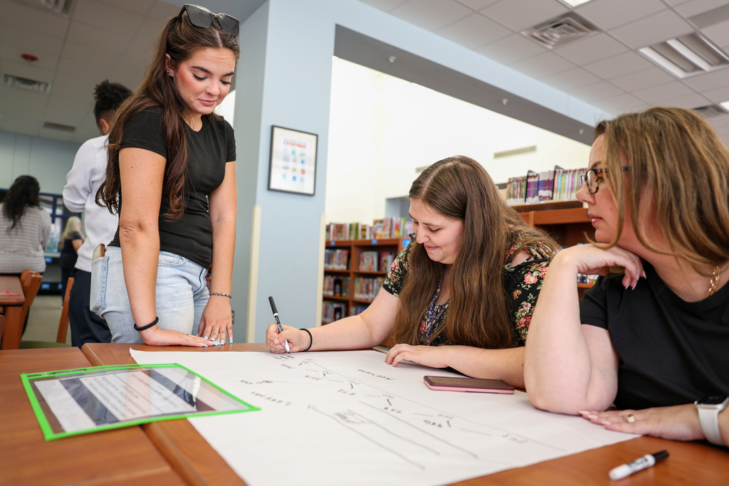 teachers attend new hire training at mcclure elementary
