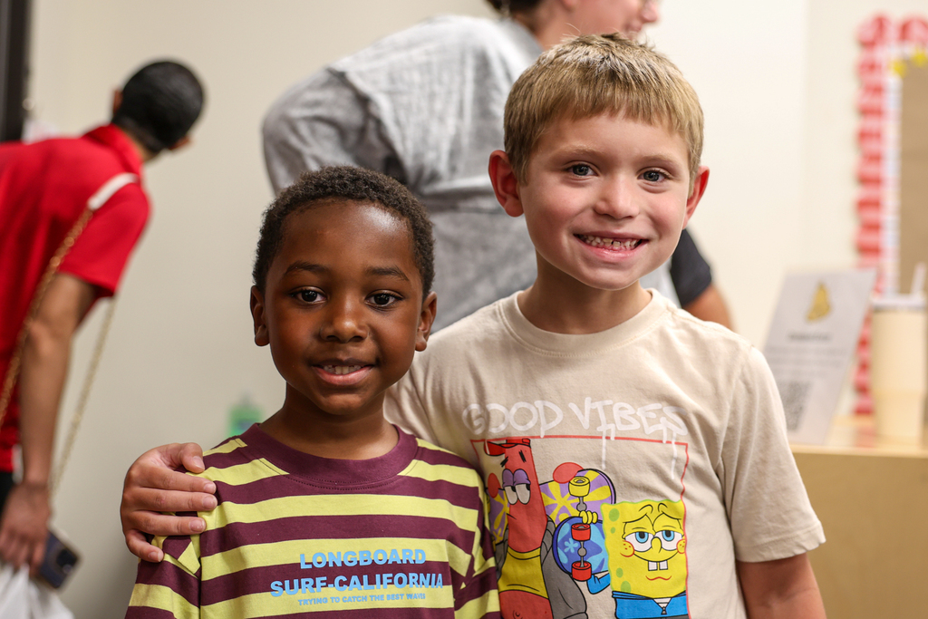 two students pose for a photo at elementary meet the teacher