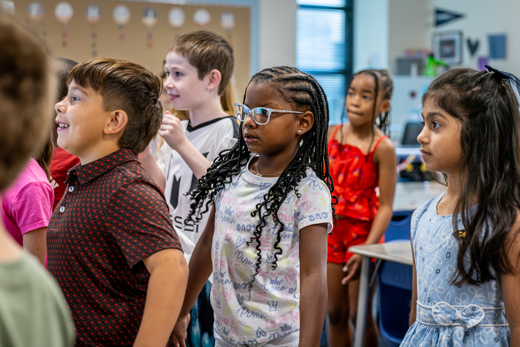 Girls in class standing for an activity