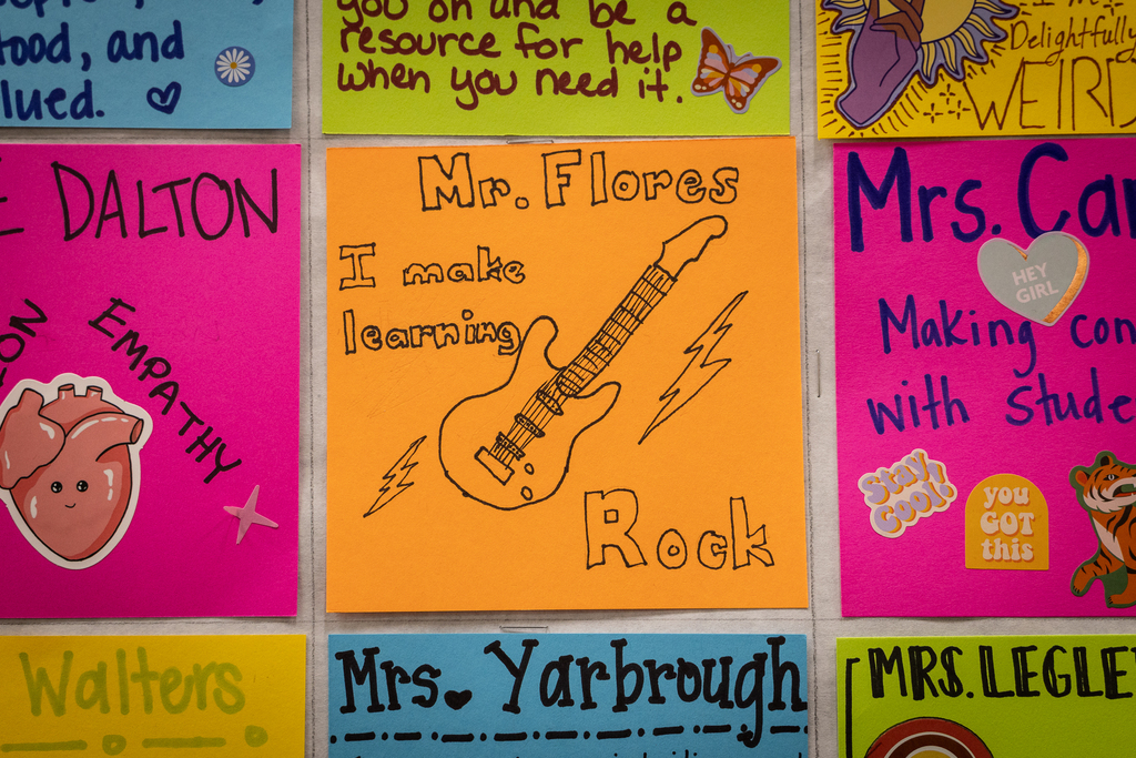 display of teacher self descriptions with center piece reading "Mr. Flores. I make learning rock."