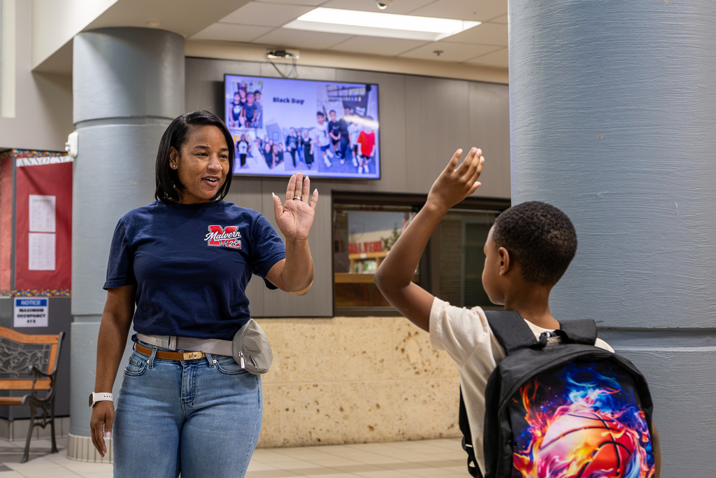 Inetra Nelson giving a high five