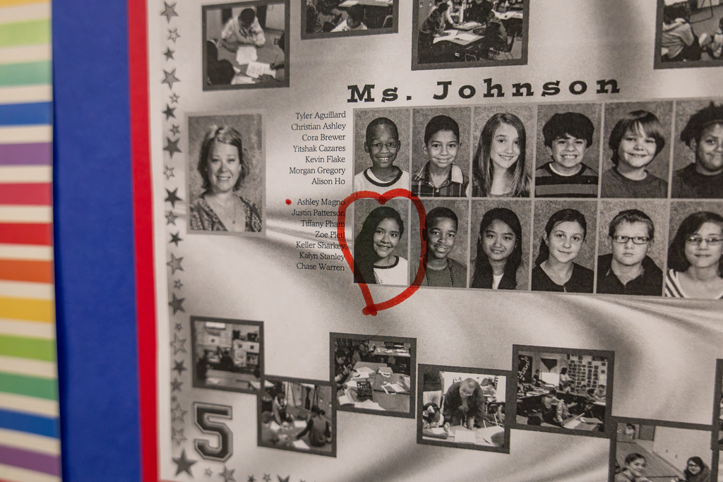 photo on display of yearbook with picture of Ashley Magno when she was a student at Malvern