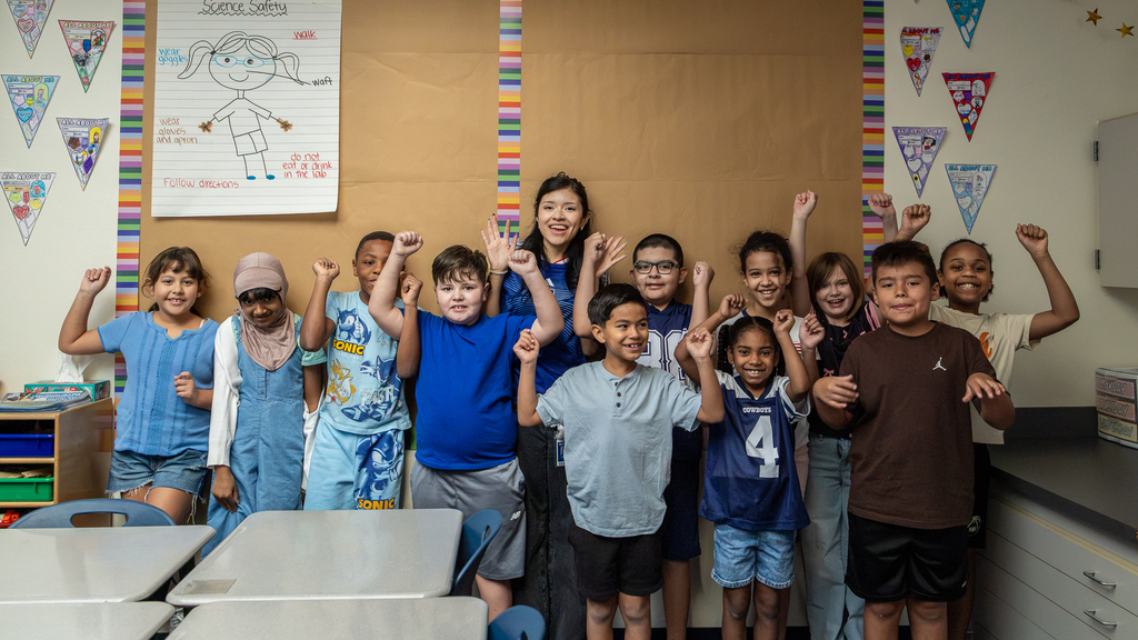 Ashley Magno standing with her class