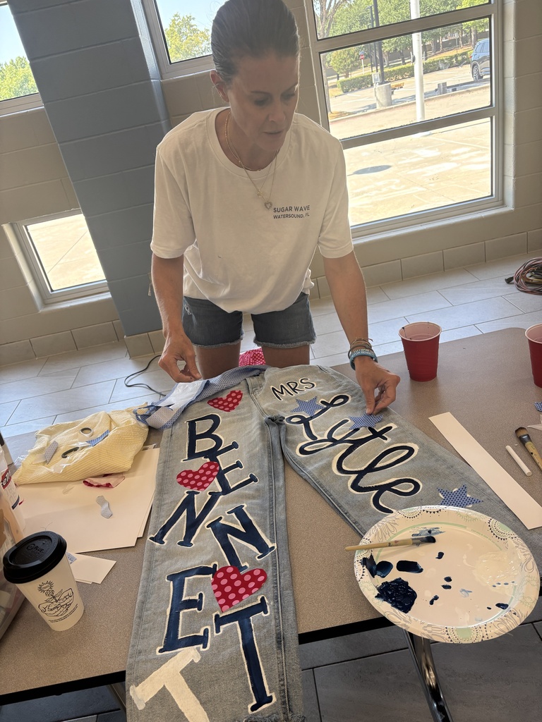 Mrs. Lytle painting her spirit jeans