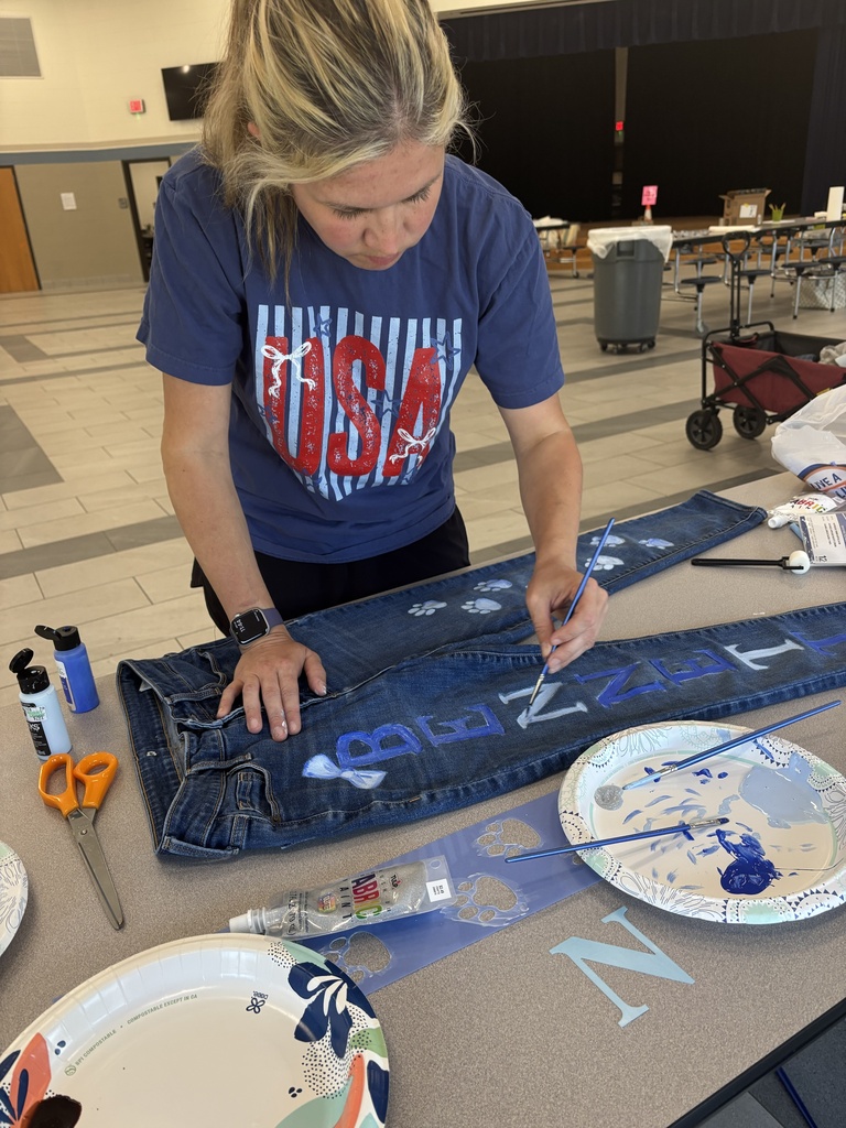 Mrs. Johnson-Vargas painting her spirit jeans
