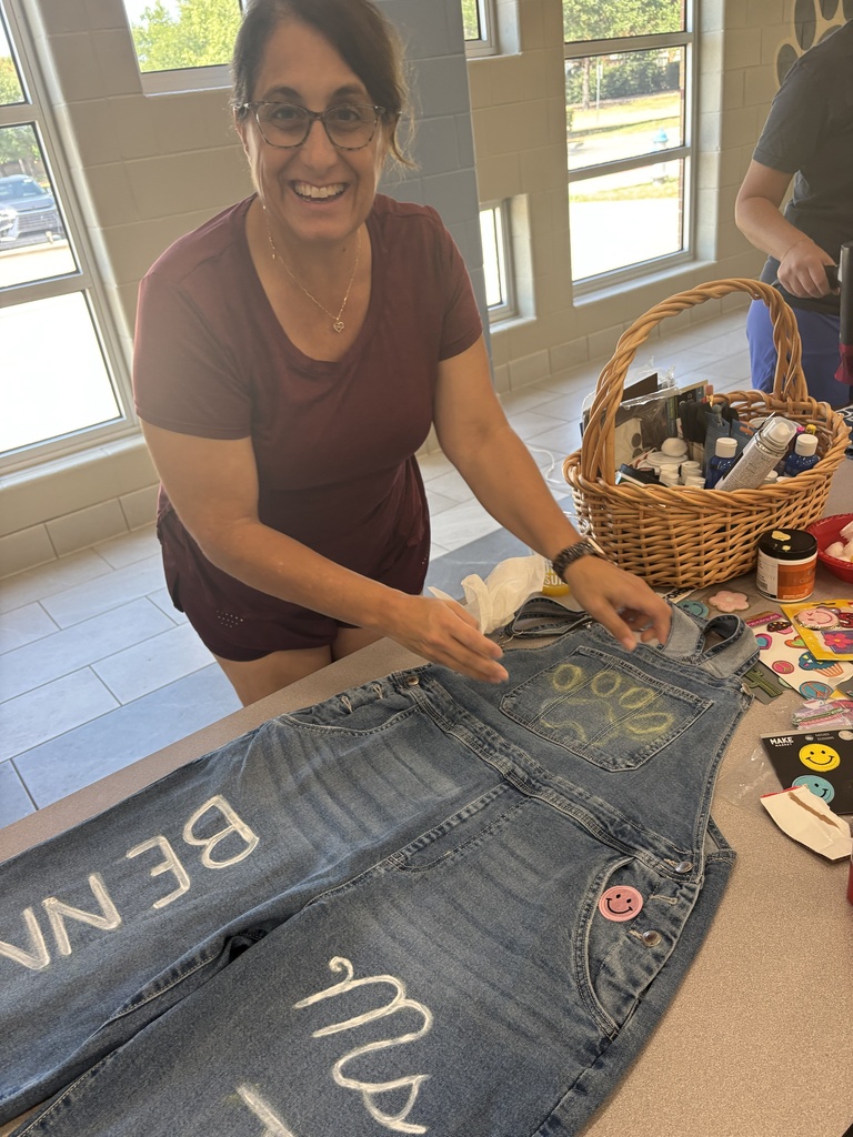Ms. Pugliese desiging her spirit overalls
