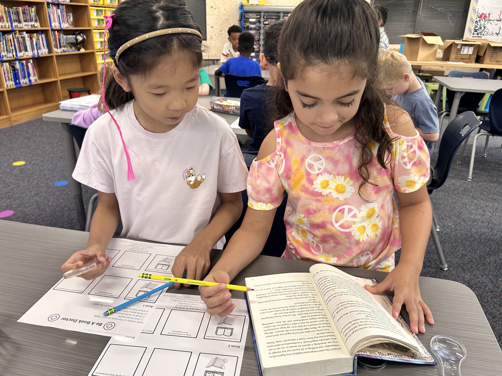 Students reading in the library.