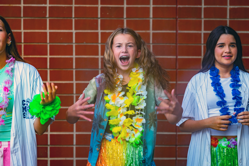girl gesturing and cheering excitedly