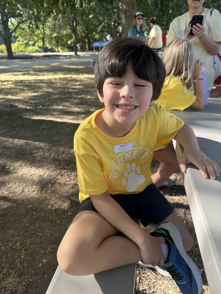 One student smiling for camera at McKinney Roots field trip