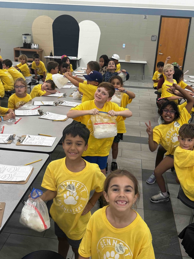 2nd graders at a table making ice cream - exploring matter changes